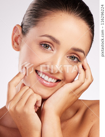 Woman, portrait and beauty with skincare in studio for facial wellness, healthy skin and happy with treatment. Model, person and face with smile for dermatology, glow or cosmetics on white background Woman, portrait and beauty with skincare in studio for facial wellness, healthy skin and happy with treatment. Model, person and face with smile for dermatology, glow or cosmetics on white background 116296224