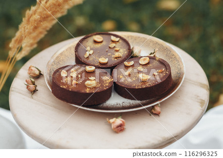 Decadent Chocolate Delights With Floral Touch 116296325