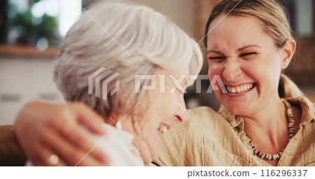 Happy, sofa and senior mother with daughter laughing together for bonding, relationship and love. Family, home and mature mom with woman in living room for conversation, talking and relax on weekend 116296337