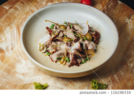 Rustic Feast: A Gourmet Bowl on A Wooden Feast Table 116296338