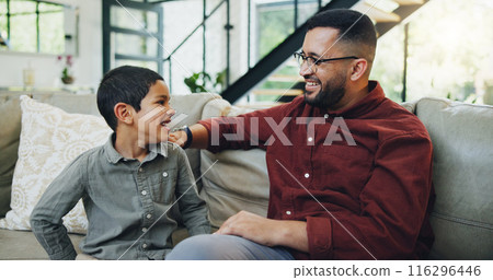 Smile, bonding and child with dad on sofa relaxing together for fathers day celebration at home. Happy, love and boy kid talking to man for care and family time on couch in living room at house. Smile, bonding and child with dad on sofa relaxing together for fathers day celebration at home. Happy, love and boy kid talking to man for care and family time on couch in living room at house. 116296446