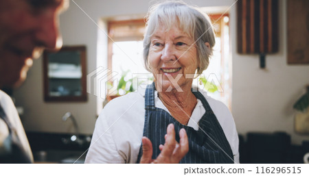 Senior couple, cooking and happy in kitchen with conversation, help and funny memory in home. Elderly woman, man and talking with meal prep, nutrition and food for wellness in retirement at house 116296515