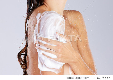 Woman, water drops and soap for washing in studio, clean and shower for cosmetics or hygiene. Female person, skincare and foam on white background, shoulder and refreshing liquid for routine pamper Woman, water drops and soap for washing in studio, clean and shower for cosmetics or hygiene. Female person, skincare and foam on white background, shoulder and refreshing liquid for routine pamper 116296537