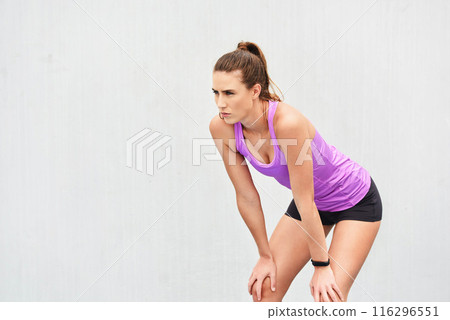 Fatigue, fitness and mockup with sports woman on white wall background for recovery or workout. Exercise, space or tired with athlete or runner at track and field event for competition or race 116296551