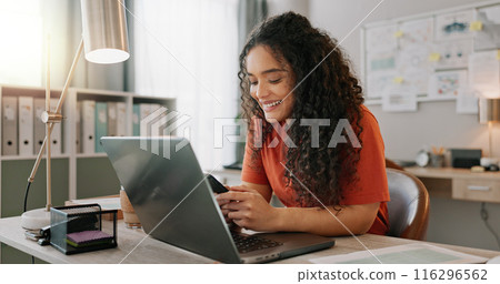 Business woman, laptop and smile for phone, communication and networking for startup in office. Happy, female employee event planner checking email on computer, social media and post on smartphone Business woman, laptop and smile for phone, communication and networking for startup in office. Happy, female employee event planner checking email on computer, social media and post on smartphone 116296562