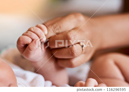 Baby, hands and holding fingers with mother in house, wellness and security together for family bonding with newborn. Bedroom, people and relax with infant for care, childhood and growth with love 116296595