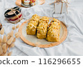 Sweet Dreams: Pastries on Bed 116296655