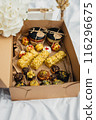Sweet Dreams: Indulgent Delights on a Cozy Bed 116296675