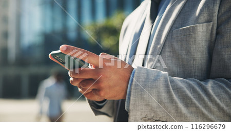 Businessman, smartphone and professional with update, online or networking in outdoor for work communication. Career person, tech and texting for news, connection and application on mobile in England 116296679