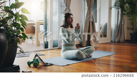 Home, tablet and woman with meditation on mat for inner peace, balance and mindfulness podcast. Calm, person and zen with spiritual healing audio for holistic exercise, awareness or chakra connection Home, tablet and woman with meditation on mat for inner peace, balance and mindfulness podcast. Calm, person and zen with spiritual healing audio for holistic exercise, awareness or chakra connection 116296688