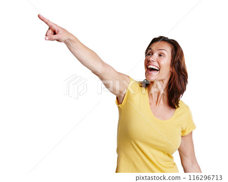 Happy, woman and pointing in studio with discount or promotion or product placement with pride. Excited, female person and deal with gesture by white background for information or advertisement 116296713