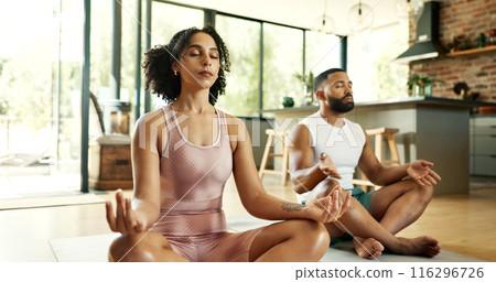 Calm, home and couple with meditation on floor for mental health, balance or mindfulness on weekend. Zen, man and woman with spiritual healing exercise for chakra, awareness or connection in marriage Calm, home and couple with meditation on floor for mental health, balance or mindfulness on weekend. Zen, man and woman with spiritual healing exercise for chakra, awareness or connection in marriage 116296726