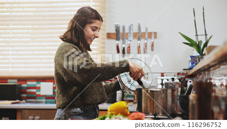 Vegetables, pot and woman with cooking in kitchen for healthy food, nutrition and dinner at home. Happy, female person and ingredients with meal prep on stove for vegan, diet and cuisine on weekend 116296752