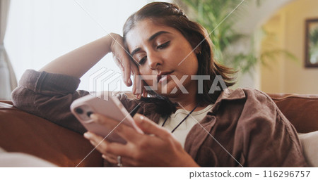 Home, relax and woman on couch, smartphone and typing with connection, social media or doom scrolling. Person, apartment or girl on sofa, cellphone or addiction with bad habit, network or digital app Home, relax and woman on couch, smartphone and typing with connection, social media or doom scrolling. Person, apartment or girl on sofa, cellphone or addiction with bad habit, network or digital app 116296757