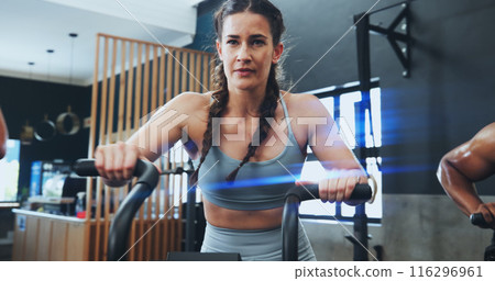 Fitness, bike machine and woman in gym for training, workout and cardiovascular endurance. Health club, people and female athlete on bicycle equipment for exercise, calorie burning or muscle strength Fitness, bike machine and woman in gym for training, workout and cardiovascular endurance. Health club, people and female athlete on bicycle equipment for exercise, calorie burning or muscle strength 116296961