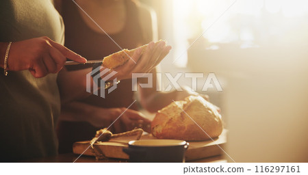 Kitchen, morning and hands of people with bread on counter with slice for sandwich, breakfast and meal. Food, baking and baked goods, roll or loaf for wellness, eating and carbohydrates in home 116297161