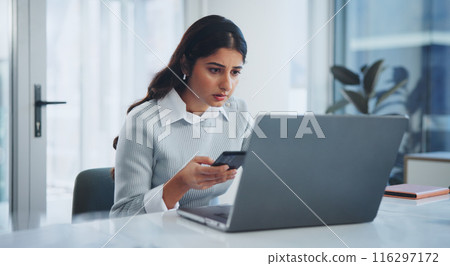 Business, woman and phone with laptop in office for reading client contact info, administration and mobile app. Professional, employee and technology for project management or networking at workspace Business, woman and phone with laptop in office for reading client contact info, administration and mobile app. Professional, employee and technology for project management or networking at workspace 116297172