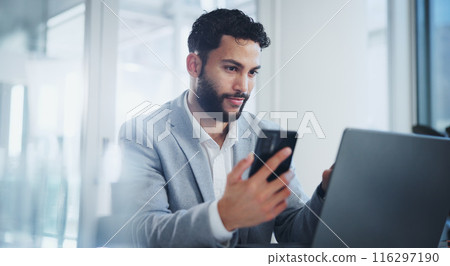 Office, phone and business man on laptop for online networking, website and internet at desk. Corporate, professional and person on smartphone and computer for research, communication and email Office, phone and business man on laptop for online networking, website and internet at desk. Corporate, professional and person on smartphone and computer for research, communication and email 116297190