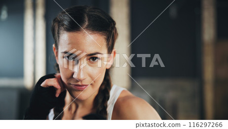 Face, gym and boxing with training, woman and practice for match and sports with endurance. Challenge, fighter or boxer with workout or girl in wellness centre or progress with health and fitness Face, gym and boxing with training, woman and practice for match and sports with endurance. Challenge, fighter or boxer with workout or girl in wellness centre or progress with health and fitness 116297266