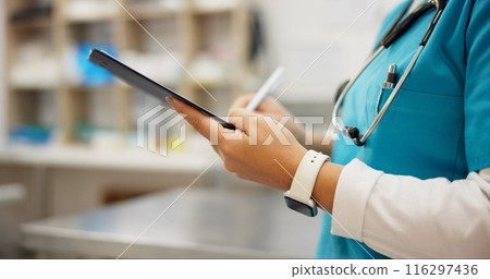 Woman, vet and hands writing with tablet for research on animal medicine, study or browsing at clinic. Closeup of female person or veterinarian taking notes on technology for medical or pet treatment Woman, vet and hands writing with tablet for research on animal medicine, study or browsing at clinic. Closeup of female person or veterinarian taking notes on technology for medical or pet treatment 116297436