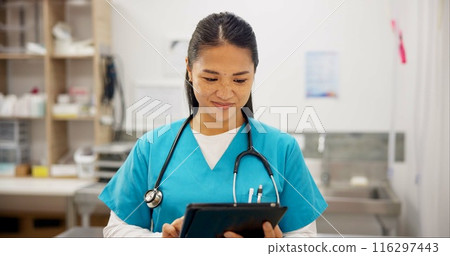 Happy woman, vet and research with tablet for animal medicine, study or browsing at clinic. Young asian female person or veterinarian scrolling on technology for medical search or pet treatment 116297443