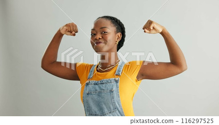 Happy, portrait and black woman flex in studio for achievement, satisfaction or celebration on gray background. Strength, victory and excited person for accomplishment, champion or winner with mockup 116297525