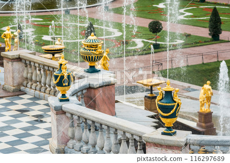 decorative vintage vases on the balustrade above the fountains in the Grand Cascade in Peterhof, Russia. decorative vintage vases on the balustrade above the fountains in the Grand Cascade in Peterhof, Russia. 116297689