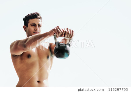 Man, stretching and kettlebell fitness in park for strength, bodybuilding routine and training. Weightlifting, metal equipment and exercising person with bodybuilder, workout and health for muscles Man, stretching and kettlebell fitness in park for strength, bodybuilding routine and training. Weightlifting, metal equipment and exercising person with bodybuilder, workout and health for muscles 116297793