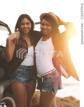 Road trip, summer and portrait of women at beach for holiday, vacation and bonding on weekend. Travel, nature and happy people by ocean with van for adventure, journey and relax together by sea 116297828