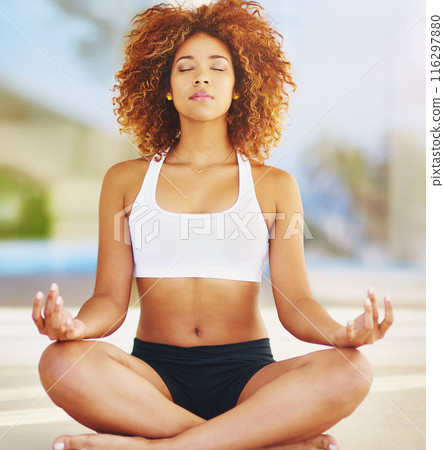Woman, relax and meditation with zen for inner peace, spiritual wellness or fitness on floor at patio. Calm or young female person or yogi in lotus pose for outdoor workout, exercise or yoga at home 116297880