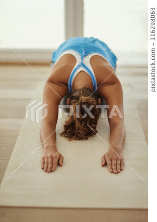 Yoga, mindfulness stretch and woman in home for health, wellness and fitness exercise. Pilates, zen chakra and calm yogi for spiritual training, holistic workout or peace in apartment living room Yoga, mindfulness stretch and woman in home for health, wellness and fitness exercise. Pilates, zen chakra and calm yogi for spiritual training, holistic workout or peace in apartment living room 116298063