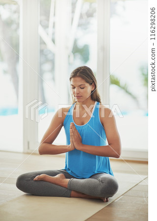 Woman, meditation and yoga for peace, calm and holistic wellness with zen, health and spiritual healing at home. Person on floor with praying hands or namaste for mindfulness, faith and chakra energy 116298206
