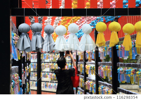 Many Teru Teru Bozu dolls displayed at the shrine 116298354