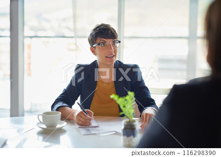 Notes, talking or businesswoman in meeting, discussion or collaboration for company or growth. Teamwork, review or budget analyst in office planning for writing, feedback report or project funding Notes, talking or businesswoman in meeting, discussion or collaboration for company or growth. Teamwork, review or budget analyst in office planning for writing, feedback report or project funding 116298390