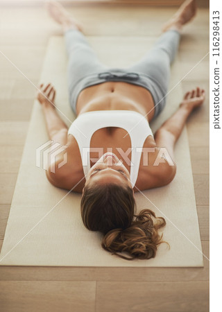 Woman, home and yoga savasana for relax, wellness or zen for healthy body. Female person, house and calm peace with corpse pose for natural breathing on floor, above or balance exercise for mindset Woman, home and yoga savasana for relax, wellness or zen for healthy body. Female person, house and calm peace with corpse pose for natural breathing on floor, above or balance exercise for mindset 116298413