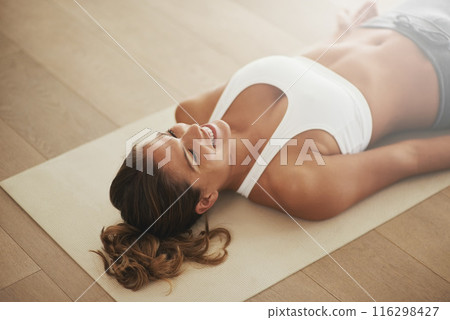 Woman, house and yoga savasana for relax, wellness or zen for healthy body. Female person, home and calm peace with corpse pose for natural breathing on floor, happy for balance exercise with mindset 116298427