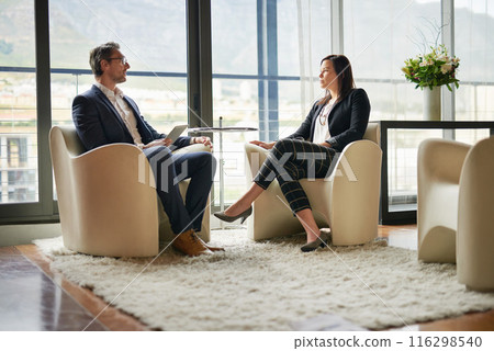 Tablet, man and businesswoman in meeting, conversation or discussion for talking with investment. Teamwork, technology or financial investors planning for strategy, feedback report or project funding Tablet, man and businesswoman in meeting, conversation or discussion for talking with investment. Teamwork, technology or financial investors planning for strategy, feedback report or project funding 116298540