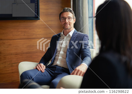 Talking, investor or businessman in meeting, conversation or discussion for company or growth. Teamwork, collaboration or financial manager planning for strategy, feedback report or project funding Talking, investor or businessman in meeting, conversation or discussion for company or growth. Teamwork, collaboration or financial manager planning for strategy, feedback report or project funding 116298622