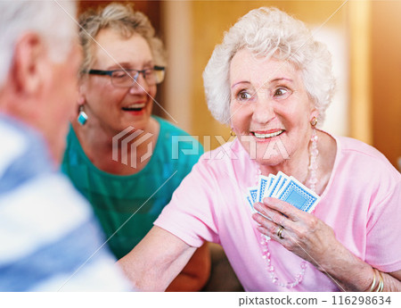 Assisted living, senior woman and poker with friends playing cards in retirement home together. Community, competition or game with happy elderly people in apartment for bonding, fun or leisure Assisted living, senior woman and poker with friends playing cards in retirement home together. Community, competition or game with happy elderly people in apartment for bonding, fun or leisure 116298634