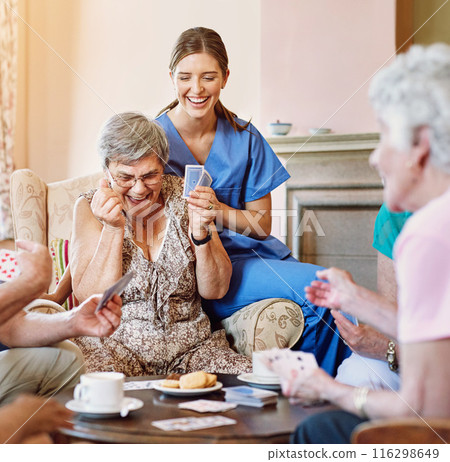Senior woman, happy and card game win in retirement home with friends or roommates for recreational fun. Nurse, victory and success in rummy or casino games with biscuits, excitement and smile. Senior woman, happy and card game win in retirement home with friends or roommates for recreational fun. Nurse, victory and success in rummy or casino games with biscuits, excitement and smile. 116298649