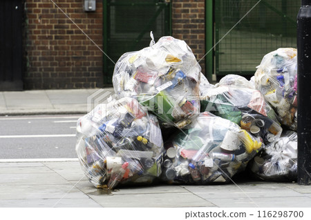 Bin full of rubbish Bin full of rubbish 116298700