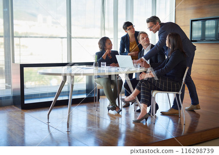 Business, people and laptop in boardroom with strategy or idea on project with teamwork and collaboration. Employee, discussion and office with conversation as partners in law firm, lawyers and plan Business, people and laptop in boardroom with strategy or idea on project with teamwork and collaboration. Employee, discussion and office with conversation as partners in law firm, lawyers and plan 116298739