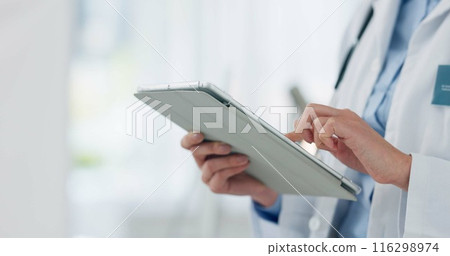 Person, doctor and hands with tablet for medical research, discovery or study at hospital. Closeup of healthcare employee scrolling on technology for telehealth, medicare or online browsing at clinic 116298974