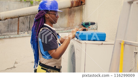 Knowledgeable professional starting routine maintenance on outdoor hvac system, preparing toolbox. Seasoned mechanic getting tools ready for checking broken air conditioner internal parts Knowledgeable professional starting routine maintenance on outdoor hvac system, preparing toolbox. Seasoned mechanic getting tools ready for checking broken air conditioner internal parts 116299009