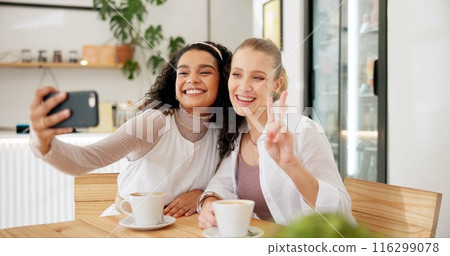 Women, friends and peace sign with coffee for selfie, social media or post on Internet for memories. Female influencers, happy and hand gesture for cafe blog or profile picture and bonding together Women, friends and peace sign with coffee for selfie, social media or post on Internet for memories. Female influencers, happy and hand gesture for cafe blog or profile picture and bonding together 116299078