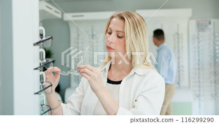 Woman, glasses and check at store for optometry, vision or wellness for eyesight, health or choice for frame. Person, customer and thinking with decision for eye care, lens and style at retail shop Woman, glasses and check at store for optometry, vision or wellness for eyesight, health or choice for frame. Person, customer and thinking with decision for eye care, lens and style at retail shop 116299290