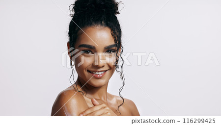 Studio, shine and cream of woman, portrait and treatment of skincare, soft and glow of body in results. Pink background, benefits and proud for skin, dermatology and cosmetics of person and hand 116299425