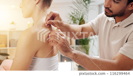 Acupuncture, back and holistic in spa with customer treatment for healing, stress relief or therapy. Body, hands and relax with masseuse in resort for massage, natural cosmetics and skincare 116299464