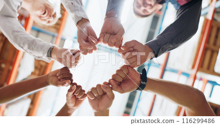 People, hands and fist bump in workplace for teamwork, collaboration and solidarity with synergy. Employee, circle and trust for strategy, partnership with support, diversity and mission in warehouse 116299486