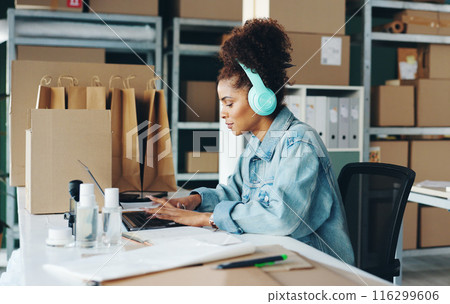 Courier business, woman and laptop in office for ecommerce, online service and manage delivery. Female owner, supplier and computer for typing, digital inventory and headphones for radio podcast Courier business, woman and laptop in office for ecommerce, online service and manage delivery. Female owner, supplier and computer for typing, digital inventory and headphones for radio podcast 116299606